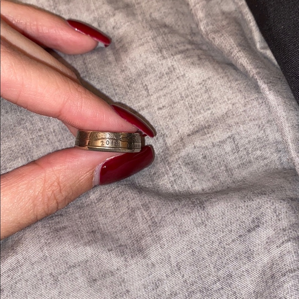Size 5.5 ring. Made from a quarter.